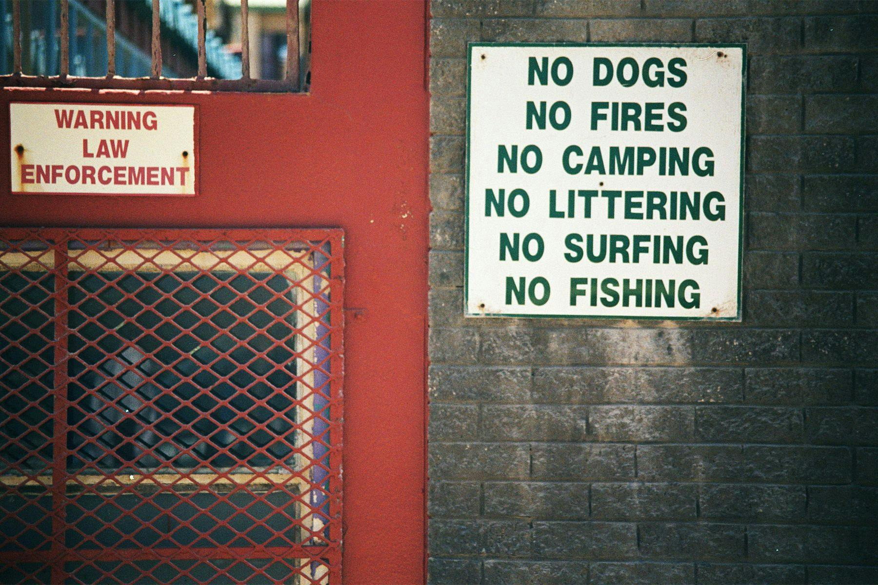 sign at a beach in south africa banning various activities