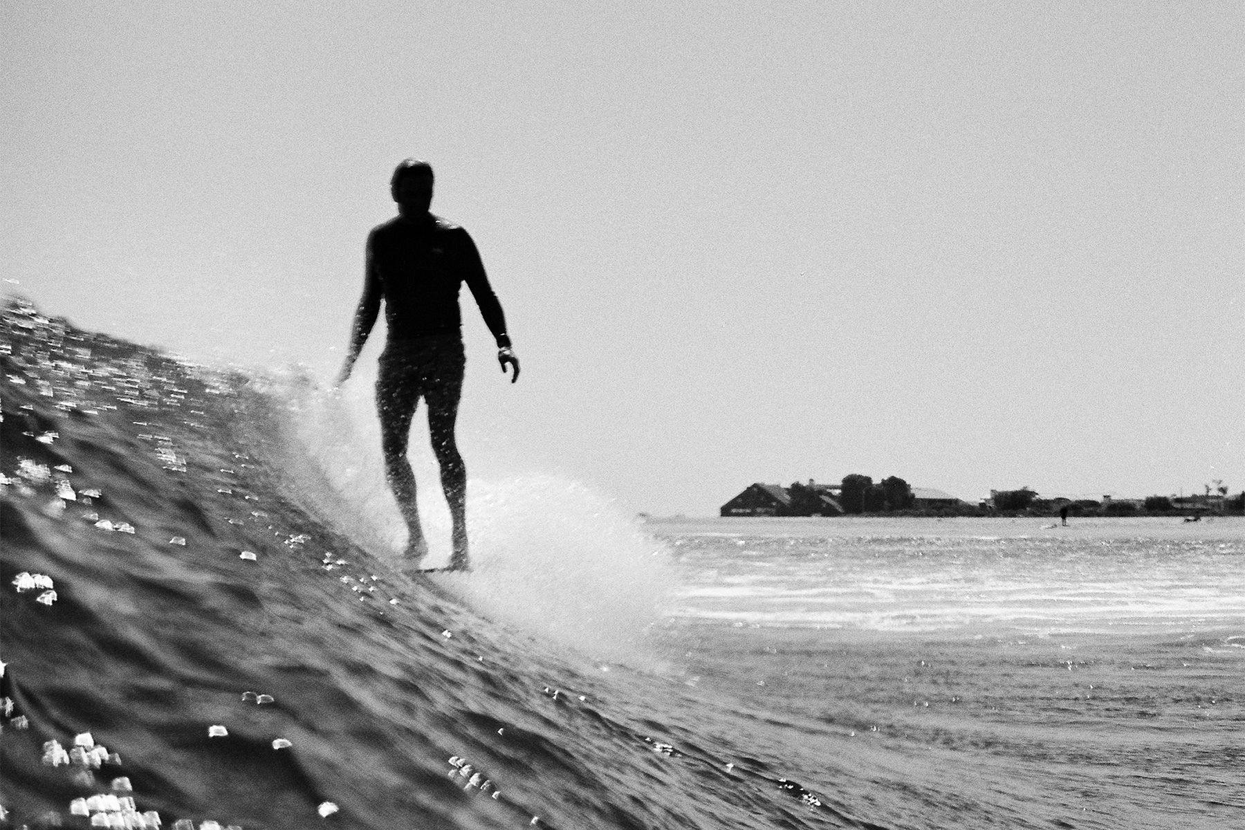 devon howard noseride in black and white captured on nikonos by grant musso