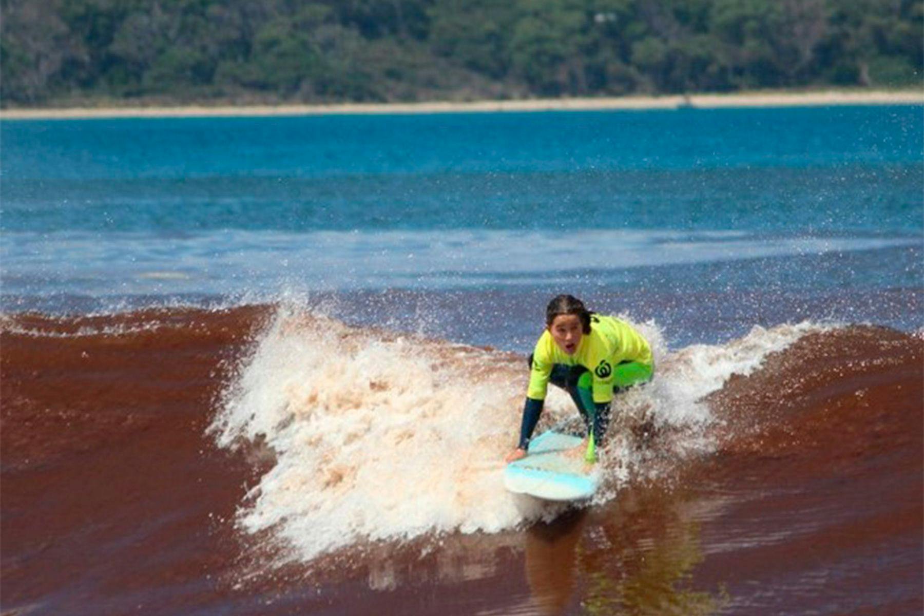 layla sharman surfing at bruny island