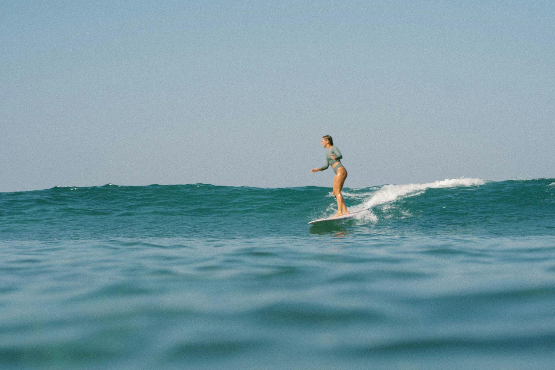 noserider surf club founder emma bukowski surfing in indonesia