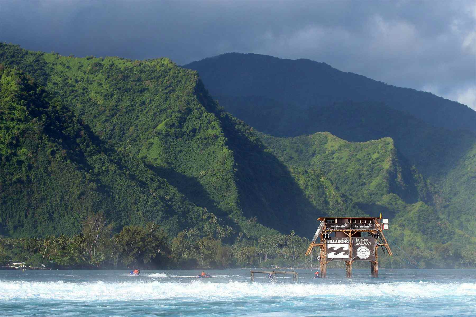 wooden judging tower in the lagoon at teahupo'o, tahiti, by nick stokes