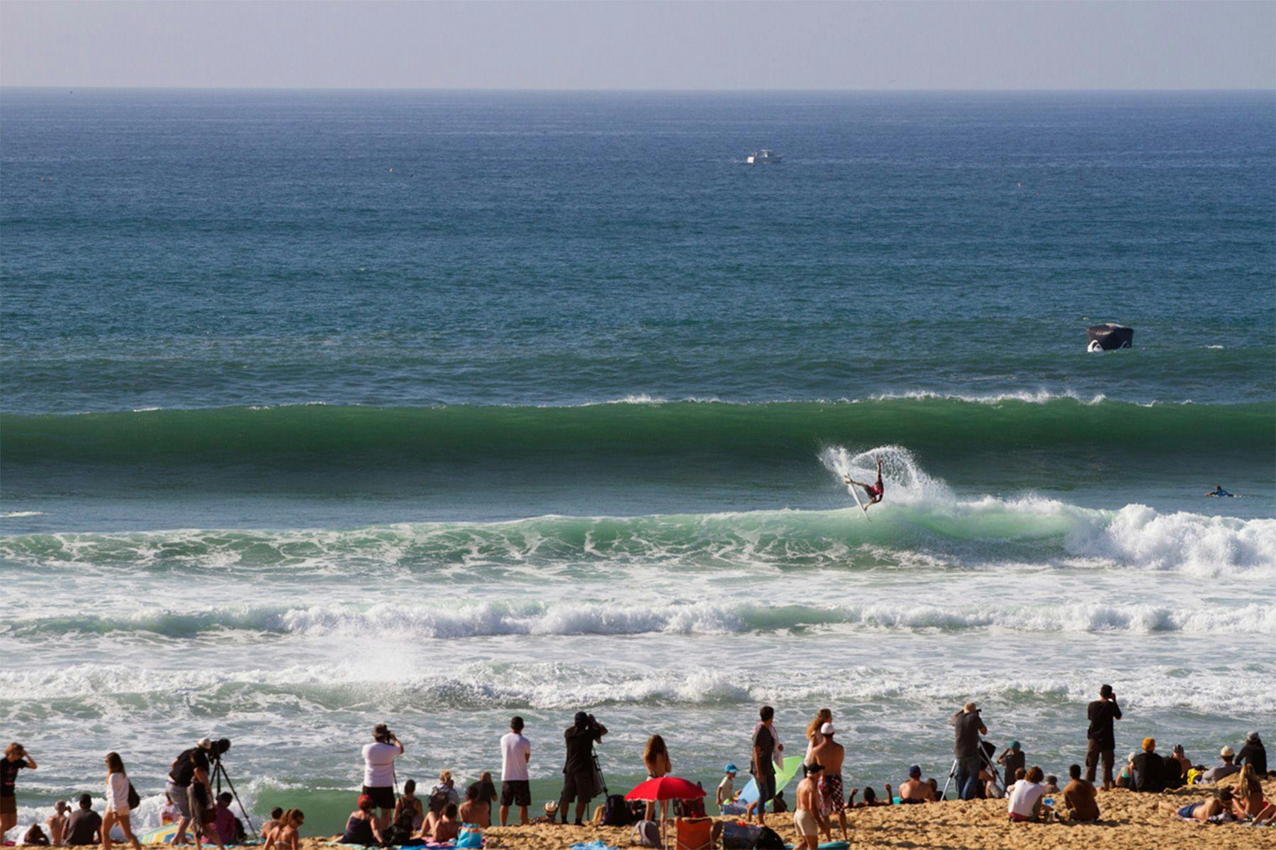 champion surfer john john florence doing an air reverse at the quiksilver pro contest in hossegor