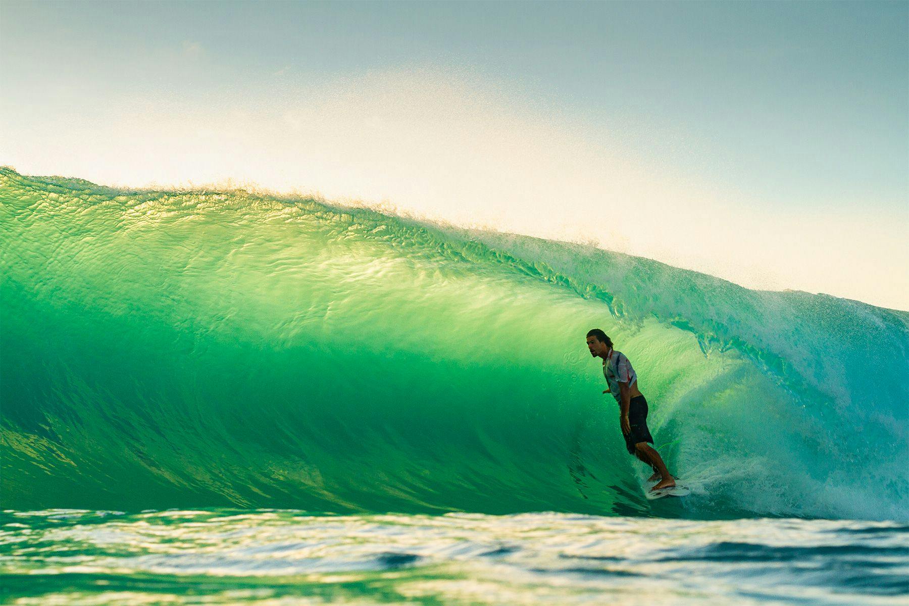 Alex Botelho in the barrel at Palmetto Point, Barbuda. Photographed by Al Mackinnon.