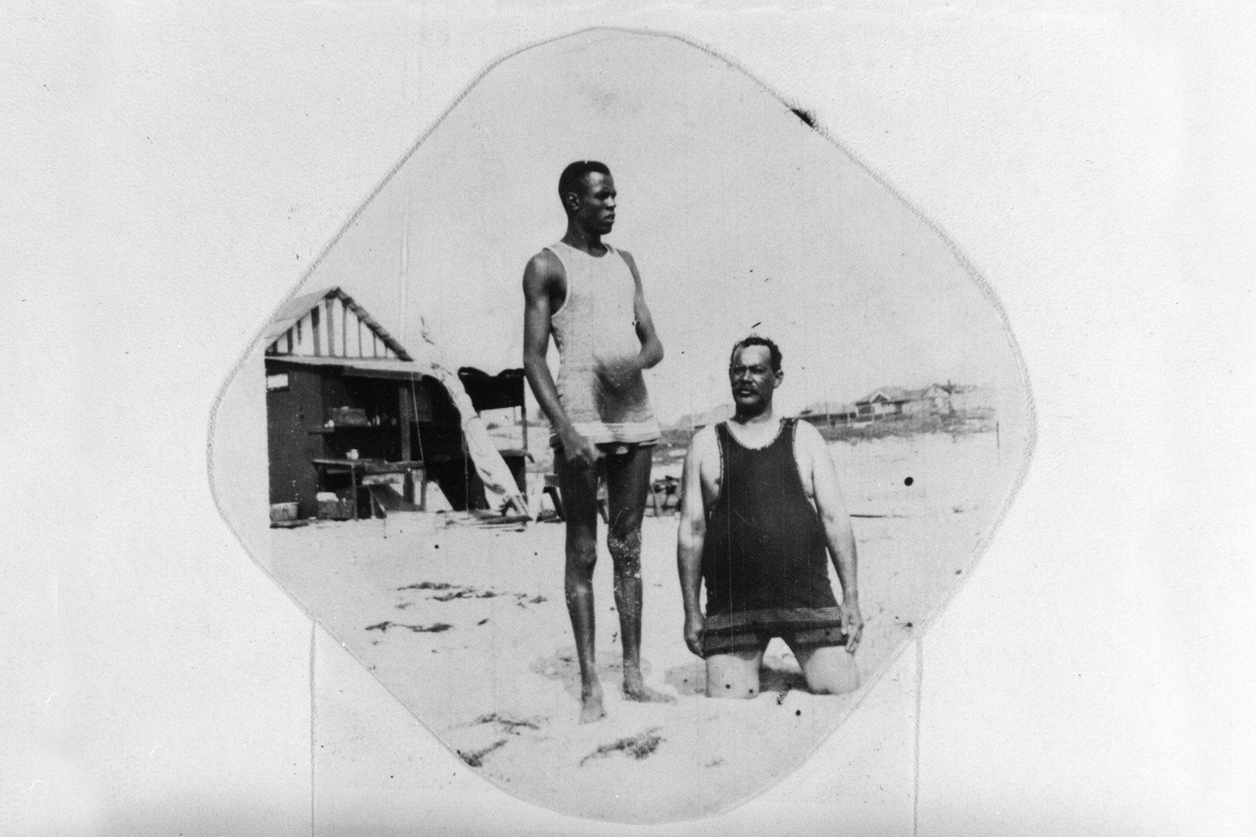 Rufus Marshall (standing) with a friend at Santa Monica beach, circa 1915. African Americans gathered near an area known sometimes as the “Ink Well,” one of only two stretches of coast along the Santa Monica Bay where they faced less harassment from white beach-goers. Shades of L.A. Collection/Los Angeles Public Library.