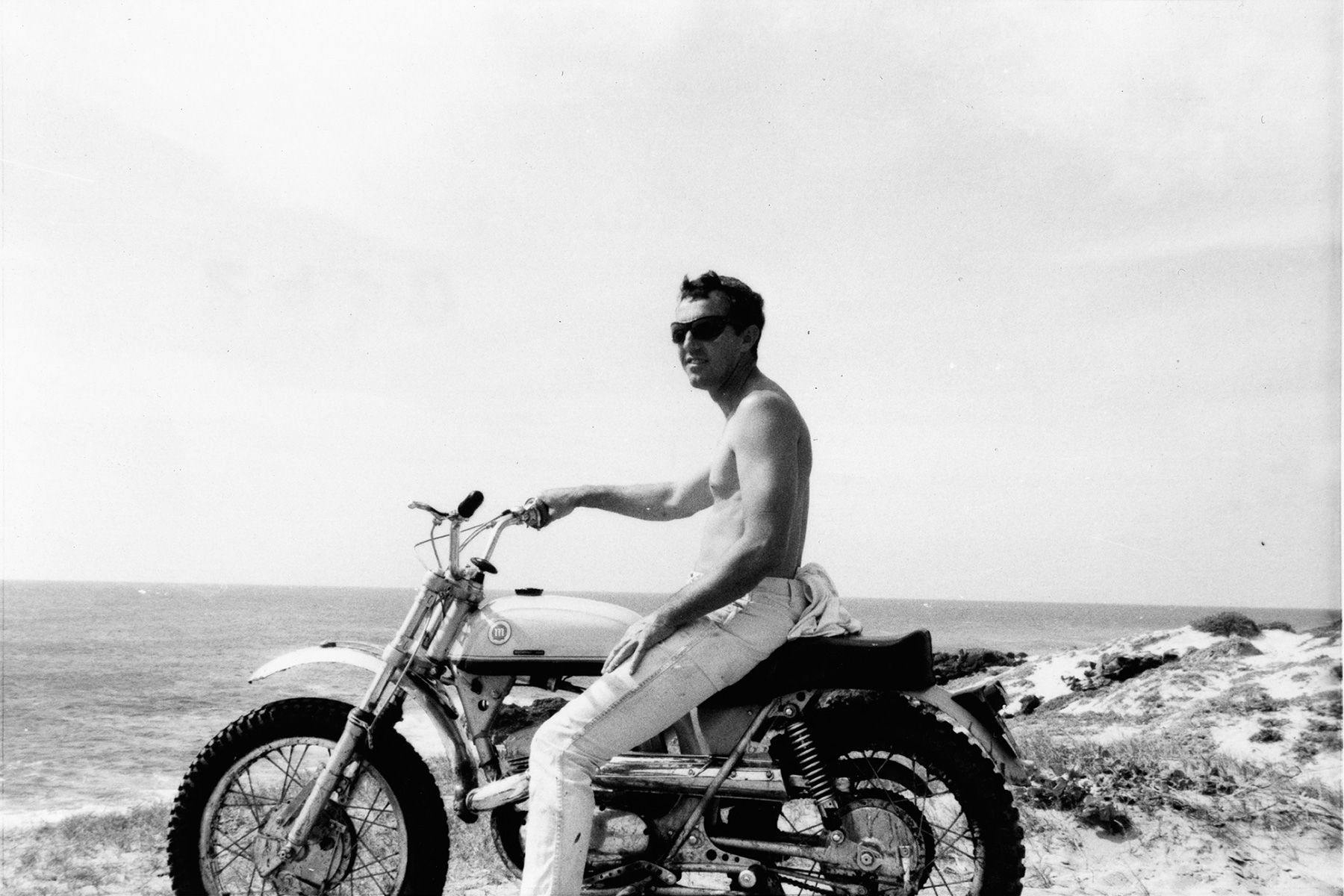 surfer dick metz sast on a motorbike