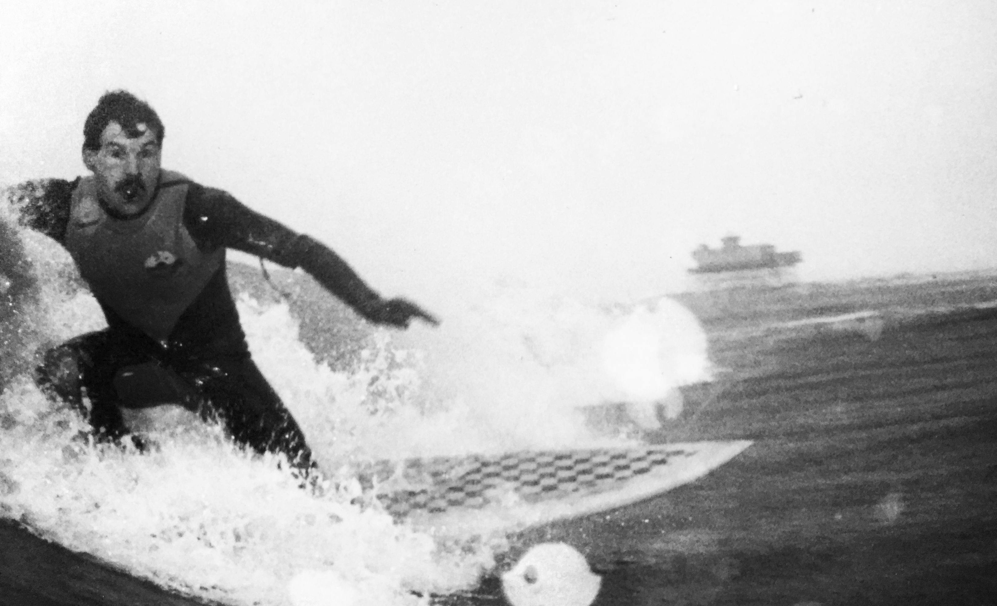One of the few photos of my dad surfing. Using a homemade camera housing, on a historical day. January 11th 1978 a storm caused the collapse of Skegness Pier, destroying the boardwalk leaving only the end theatre standing, which you can see in the background.